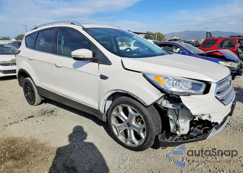 2019 Ford Escape Titanium z USA, uszkodzony, nr VIN 1FMCU0J99KUA26652
